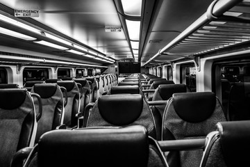 Dover, NJ USA - November 1, 2017:  New double-decker NJ Transit train at night with empty seats,...