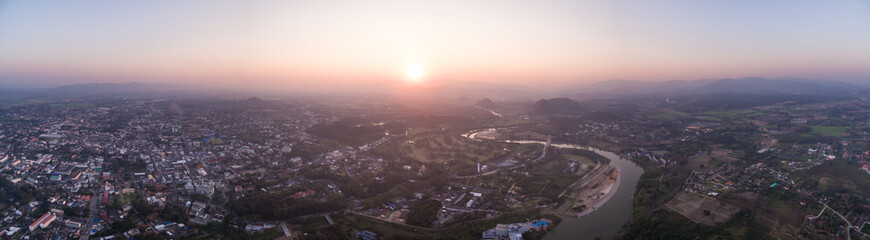 Wide Panoramic Aerial Shot Over River Kok And Chiang Rai City At Sunrise, Northern Thailand