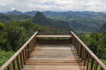 Fototapeta premium Wood balcony with mountain view