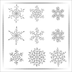 Set of hand-drawn black-and-white snowflake 