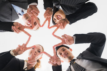 Group of people form a circle.