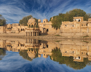 Gadi Sagar temple on Gadisar lake Jaisalmer, India.