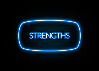 Strengths  - colorful Neon Sign on brickwall