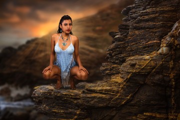 Mujer posando en rocas