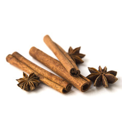 Cinnamon Sticks and Anise Stars on White Background Natural Light Selective Focus Square