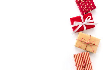 Obraz premium Christmas and New Year holiday gift boxes on white background, creative idea border design