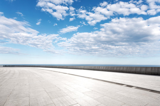 Empty Marble Floor With Beautiful Sea In Blue Cloud Sky