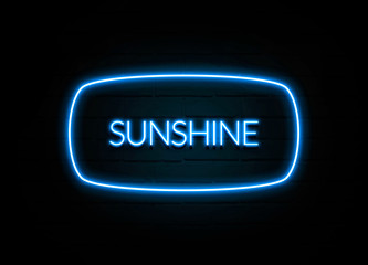 Sunshine  - colorful Neon Sign on brickwall