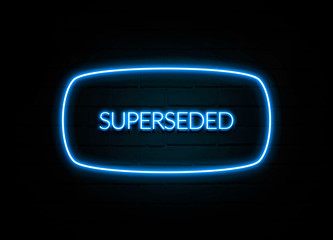 Superseded  - colorful Neon Sign on brickwall