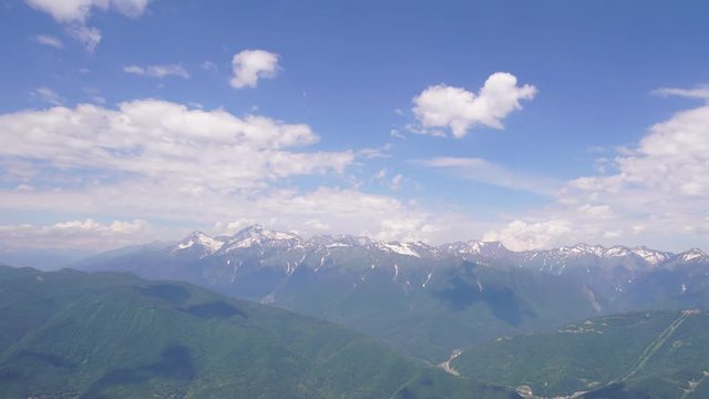 clouds on sky over mountains time lapse