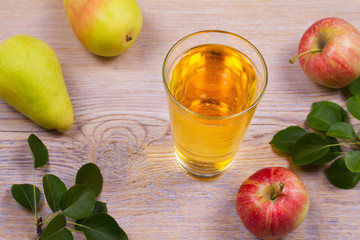 Cider on rustic wooden background with apples and pears, vhorizontal