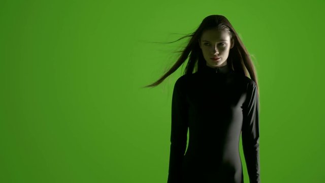 Young stylish fashion model shoot in professional studio over a green screen - shoot with blacmagic urssa mini in prores