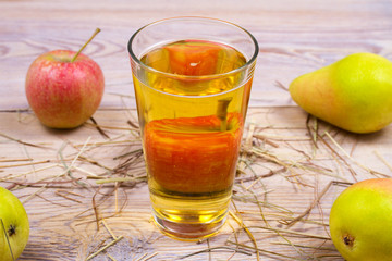 Cider on rustic wooden background with apples and pears, vhorizontal