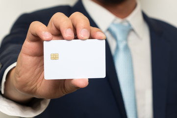 Man holding holding blank credit card