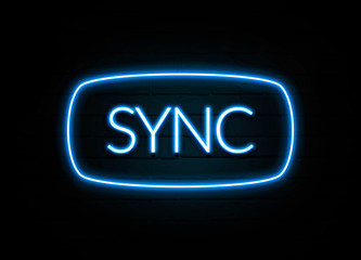 Obraz premium Sync - colorful Neon Sign on brickwall
