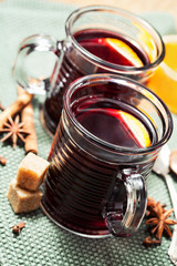 Mulled wine with spices  in glass cups