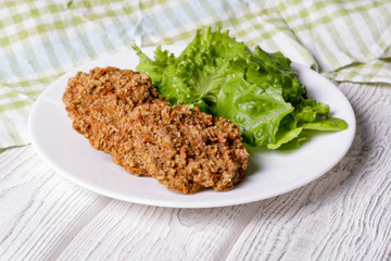 Baked fish cakes on a plate