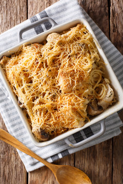 Chicken tetrazzini from spaghetti, mushrooms, cheese and cream sauce close-up. Vertical top view