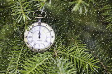 Christmas tree background and Christmas decorations with snow, blurred, sparking, glowing. Happy...