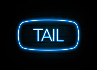 Tail  - colorful Neon Sign on brickwall