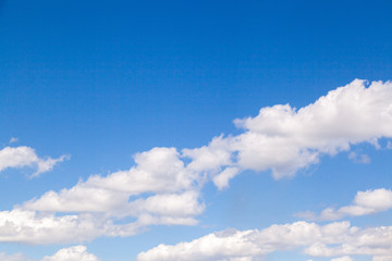 The blue sky with clouds in sunny day