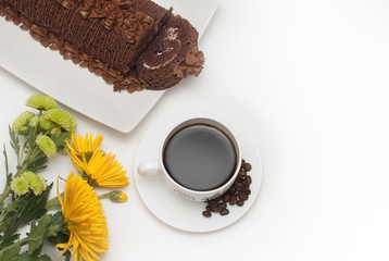 Close-up of Cup of Coffee and Chocolate Cake with Copy Space. Isolated.
