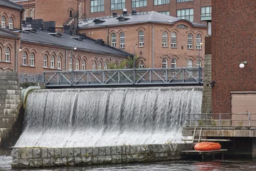 Crédence de cuisine en verre imprimé Barrage Traditional industrial buildings and dam in Tampere city. Finland