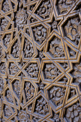 An old wood door with metal handle. Details of Muslim architecture.