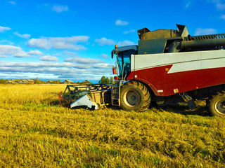 Obraz premium agricultural machinery in the field