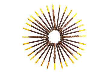 Obraz premium Chocolate Filled Biscuit Sticks on White Background