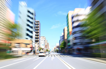 Car driving fast in Tokyo