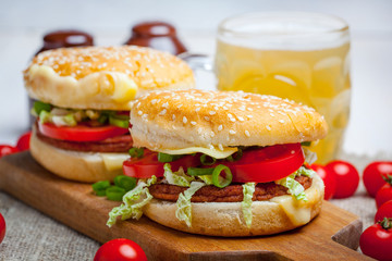 Homemade hamburger with fresh vegetables.