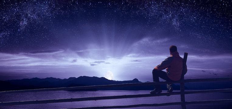 Watching the moonrise over the sea