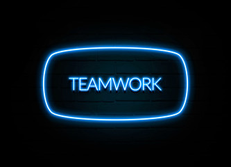 Teamwork  - colorful Neon Sign on brickwall