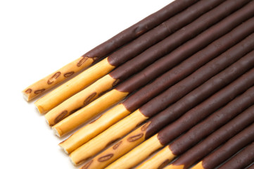 Chocolate Filled Biscuit Sticks on White Background
