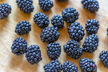 Raspberry tabletop and wooden background