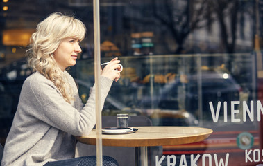 woman drinking coffee