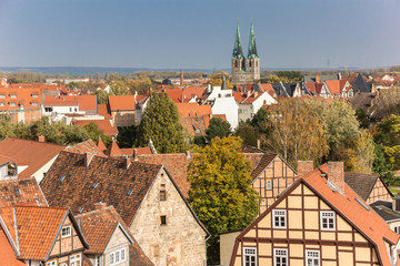 Naklejka na ściany i meble Cityscape with fall colors and church tower in Quedlinburg
