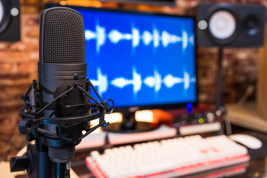 condenser microphone in digital recording, broadcasting studio background