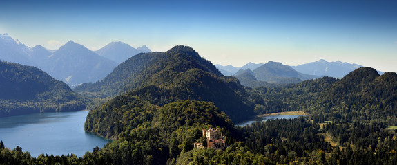 panorama view to palace Hohenschwangau Castle or Upper Swan County Palace in Hohenschwangau village...