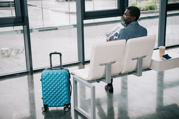 Businessman with newspaper