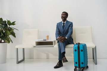 businessman waiting for departure at airport