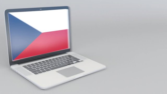 Opening and closing laptop with flag of the Czech Republic on the screen. Tourist service, travel planning or cultural study concepts