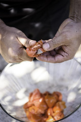 Cutting the tomato for the party