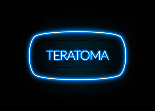 Teratoma  - colorful Neon Sign on brickwall