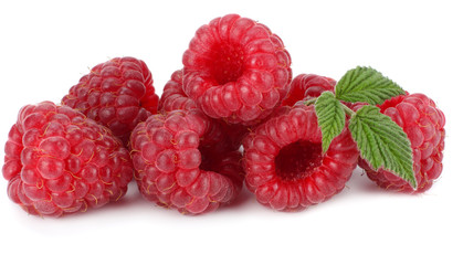 ripe raspberries with green leaf isolated on white background macro