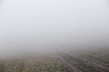 Naklejka premium Fog in the morning at the outskirt of town