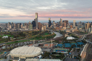 Melbourne CBD and the Melbourne Park tennis centre in the foreground.