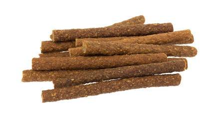 A group of beef sticks isolated on a white background.