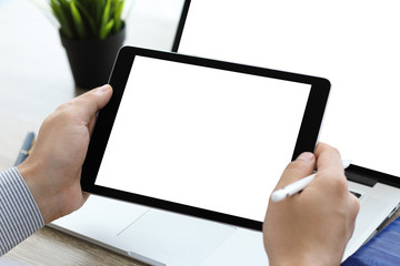 male hands holding tablet and laptop with isolated on screen